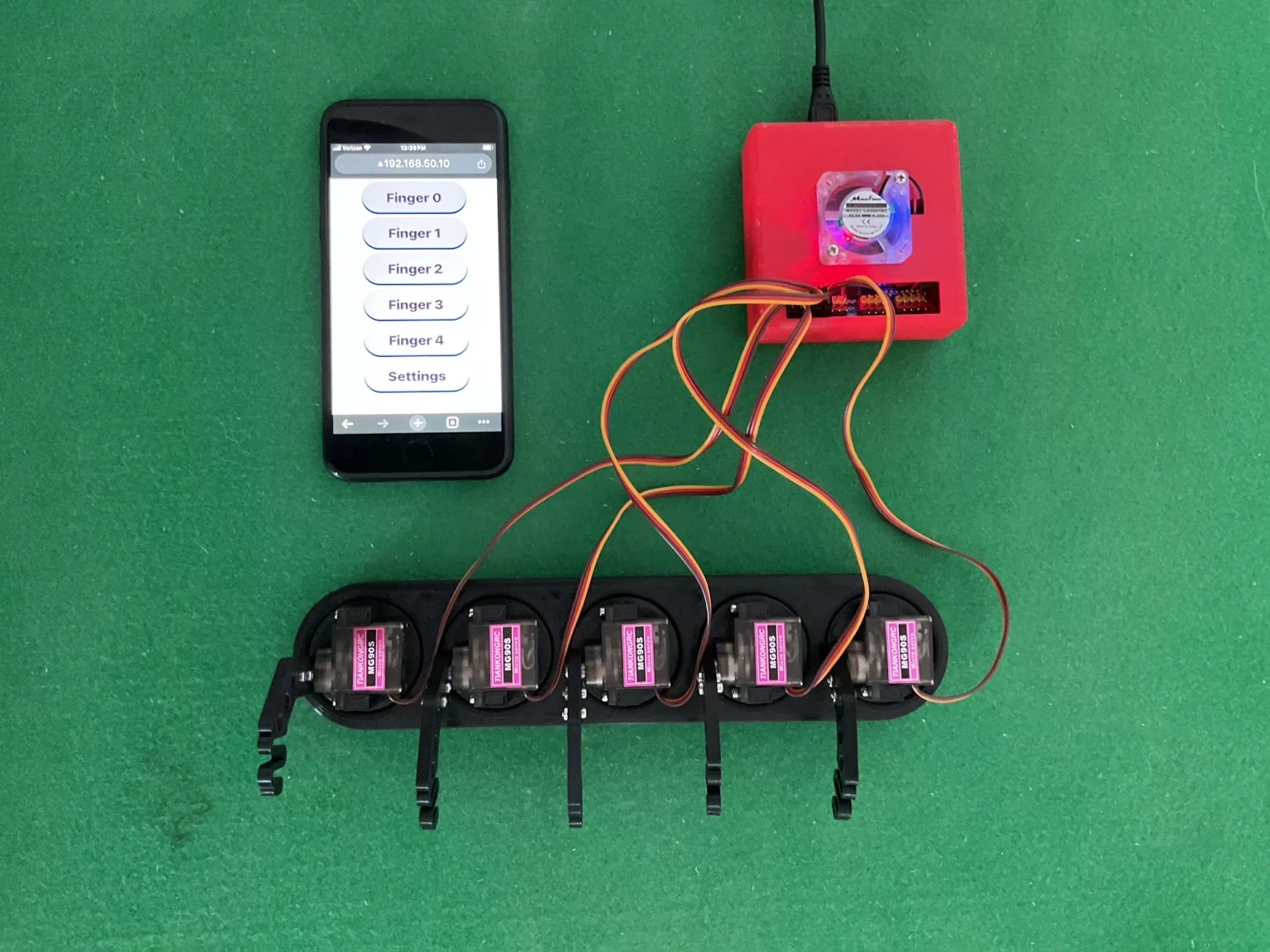 MA3 Claw five-finger robotic actuator prototype with controller and browser interface